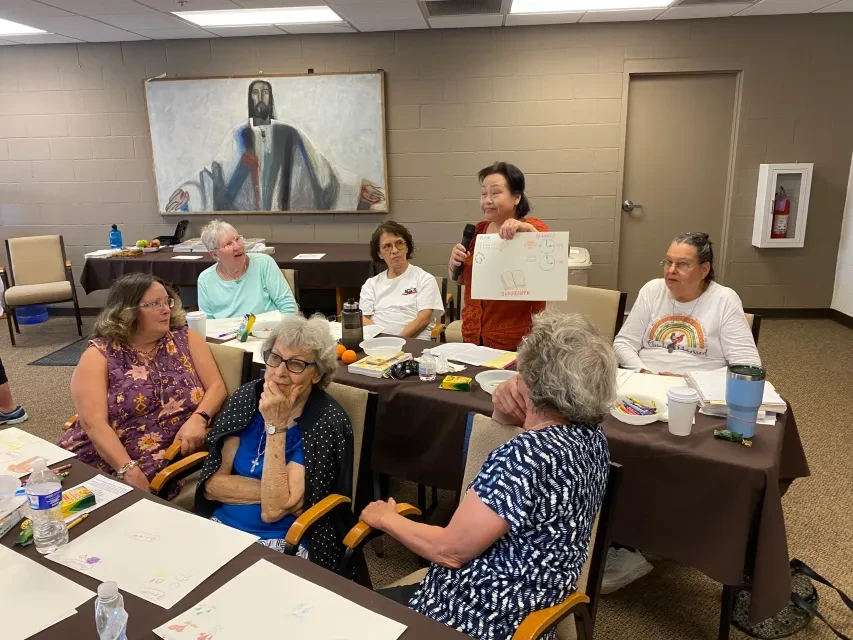 Workshop group in prayer